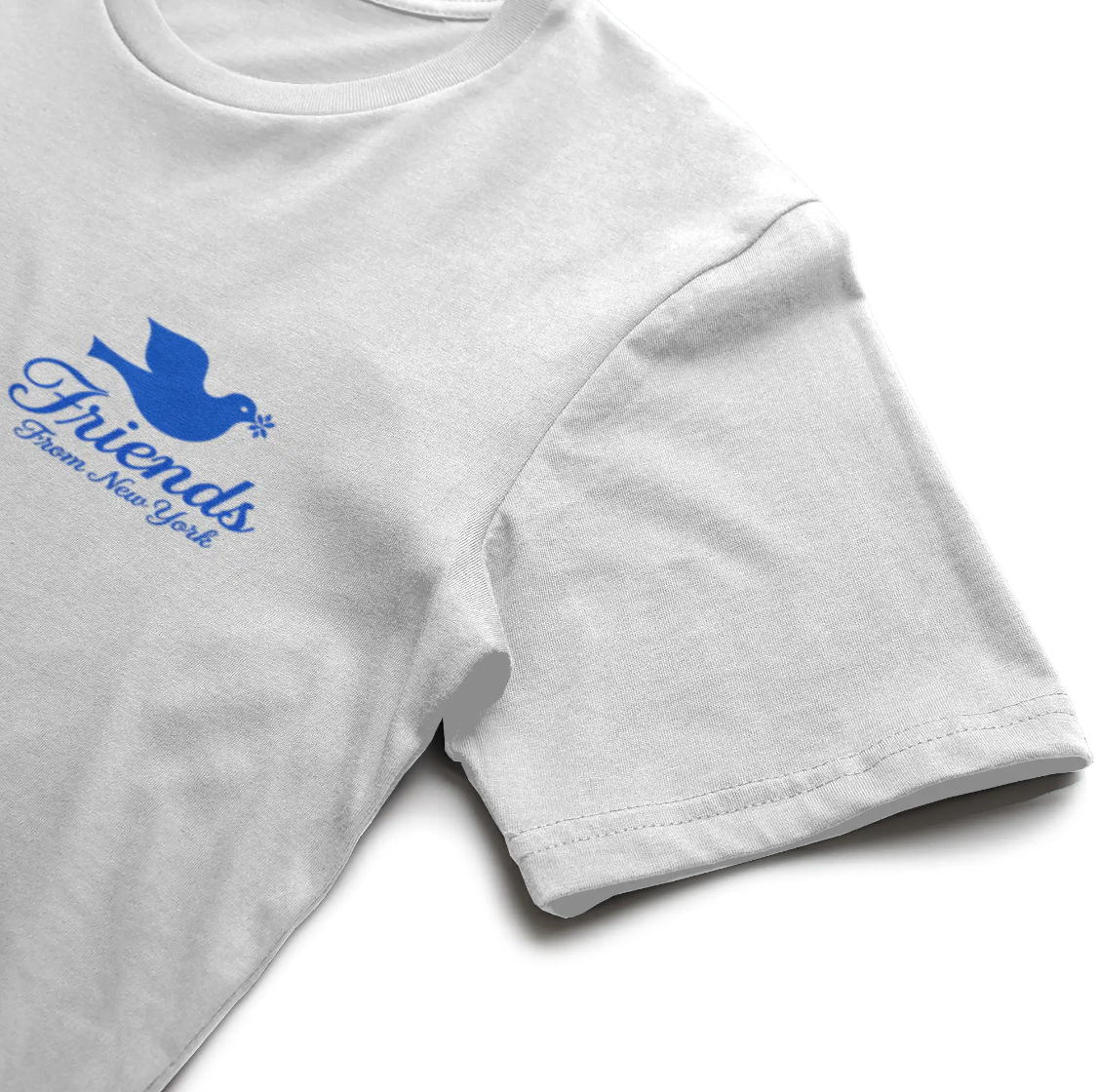 Close-up of the blue Friends From New York dove and script logo printed on a white T-shirt.