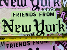 Oversized Friends From New York vinyl sticker in woodland camouflage with white lettering, shown beside a measuring tape.